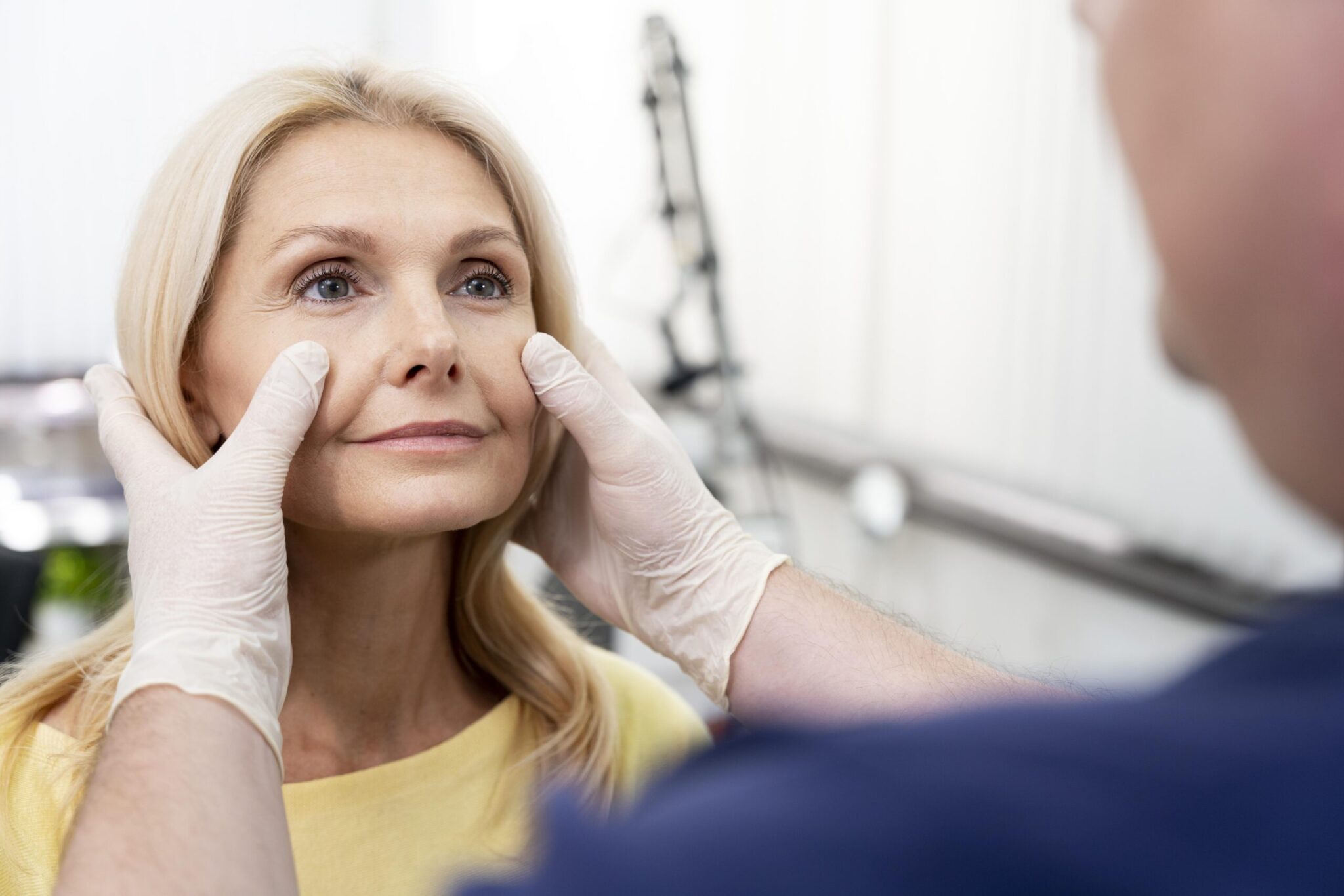 close up doctor checking patient scaled 1