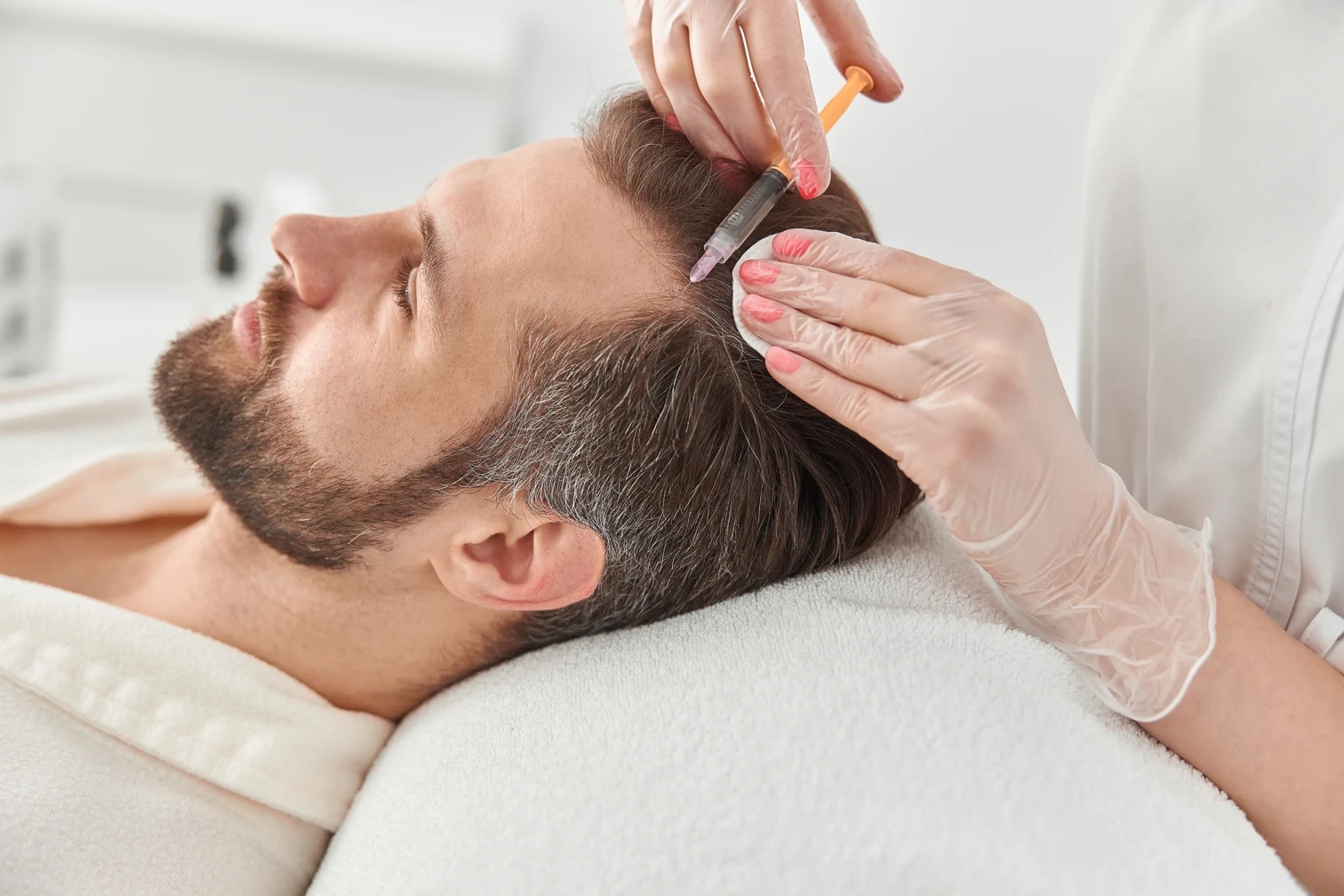 close up makes mesotherapy injections young man treatment male by beautician tightening smoothing wrinkles face skin